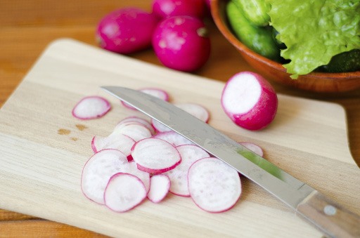 Radishes on a cutting board