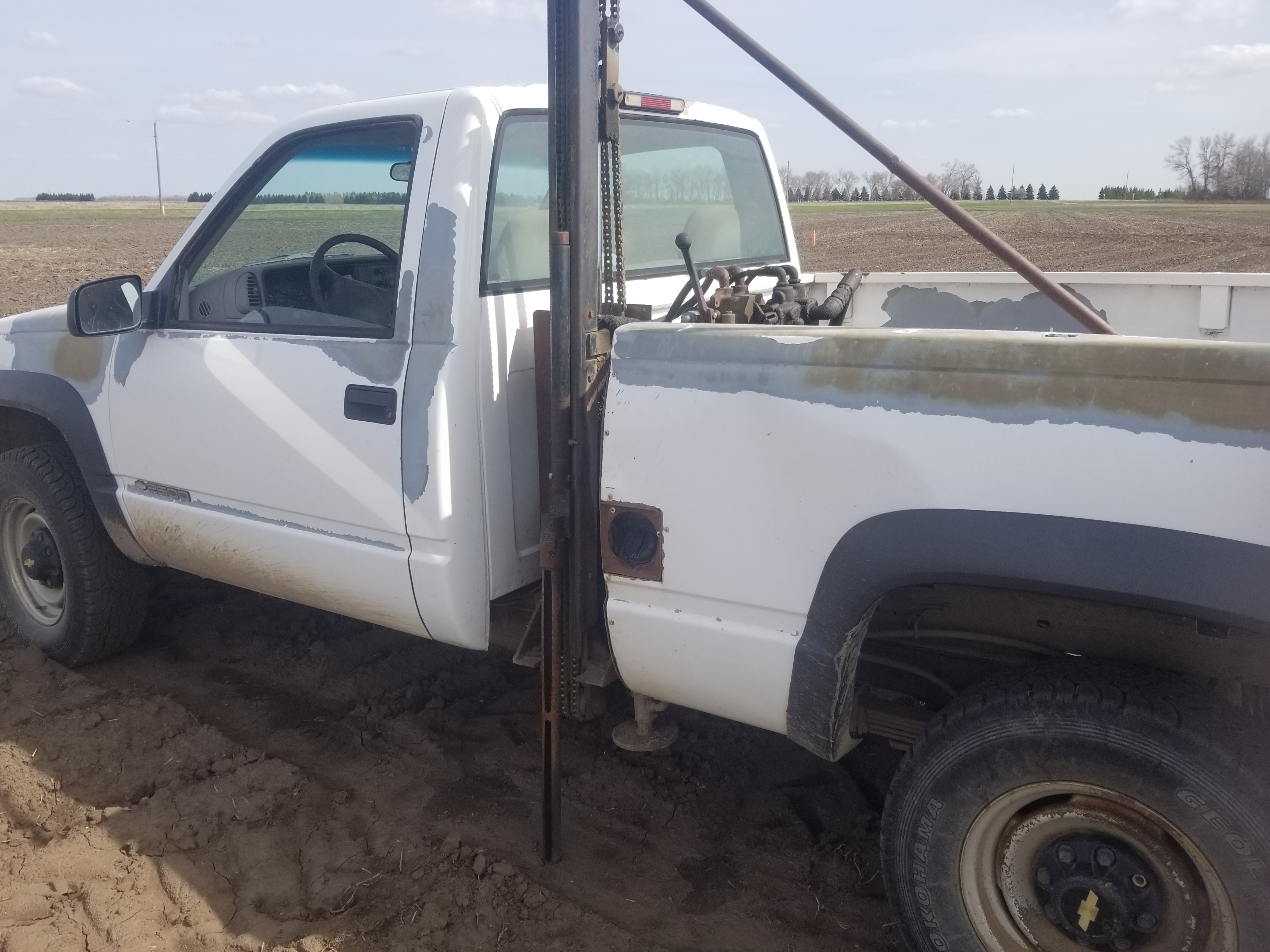 Pickup with a side-mount hydraulic soil probe