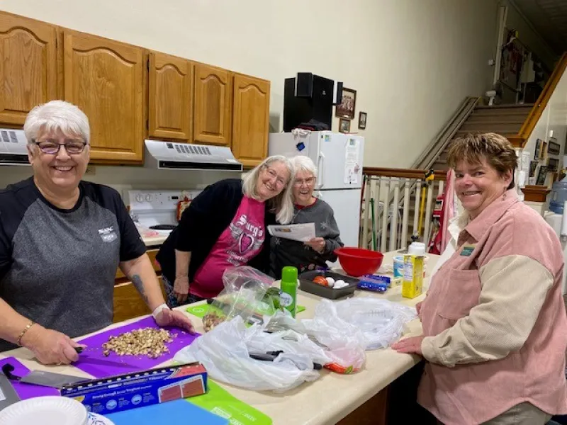 Senior citizens doing healthy food prep