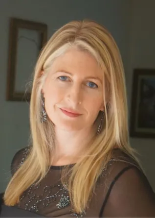 Alison Graham-Bertolini looking confidently at camera.