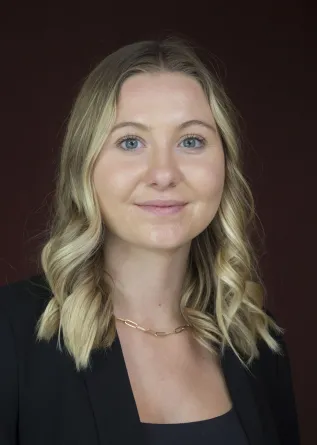 Ashlyn smiling at the camera.