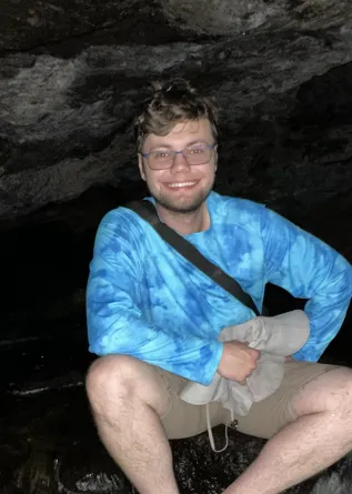 Camerson Kolthoff smiling confidently at camera.