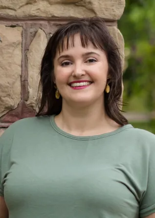 Chatham-Vazquez smiling confidently at camera.