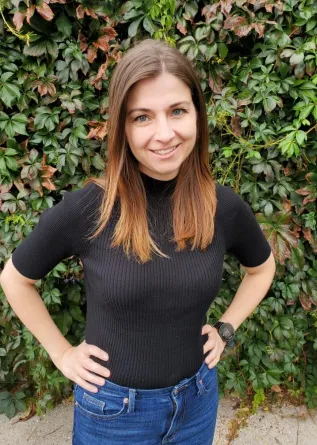 Beck smiling confidently at camera.