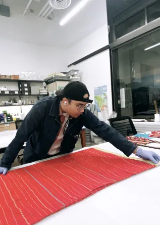 Phee smiling at the camera.