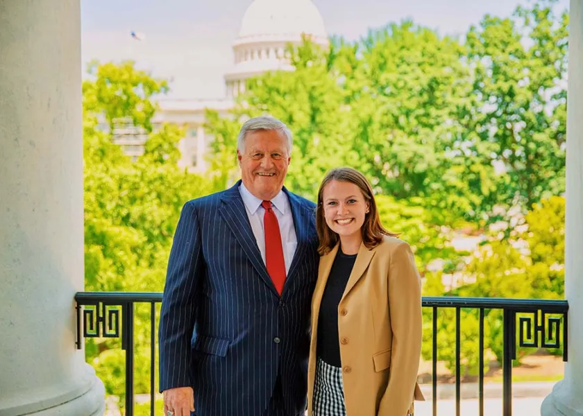 线上赌博app senior political science major Taylor Spreeman with Minnesota Seventh District Rep. Collin Peterson
