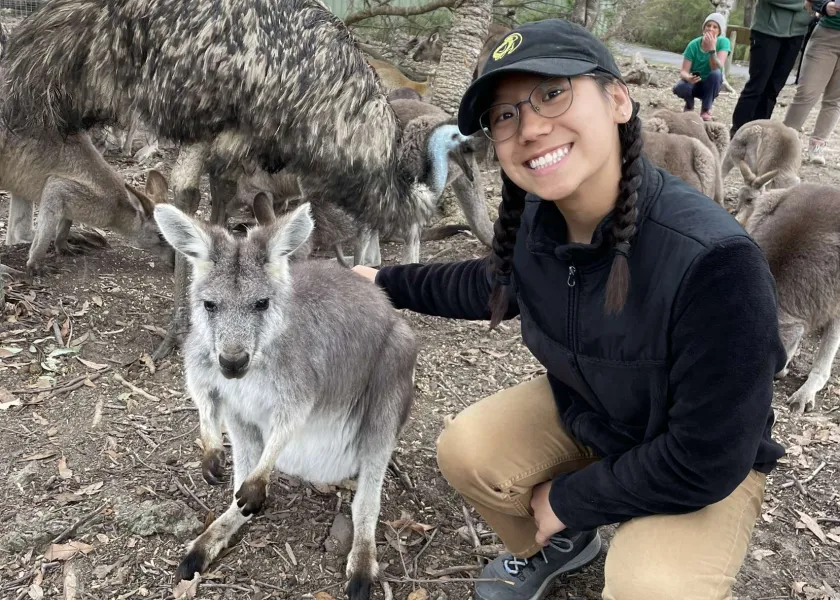 Photo of Anna Rustad and a kangaroo