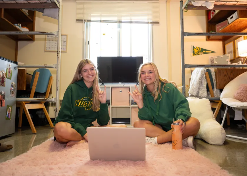 Students in a residence hall room.