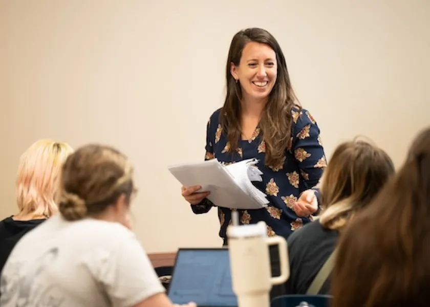 Amy Gore, assistant professor of English, teaching a class