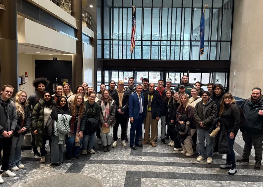 a group of 线上赌博app architecture students and faculty at the State Capitol