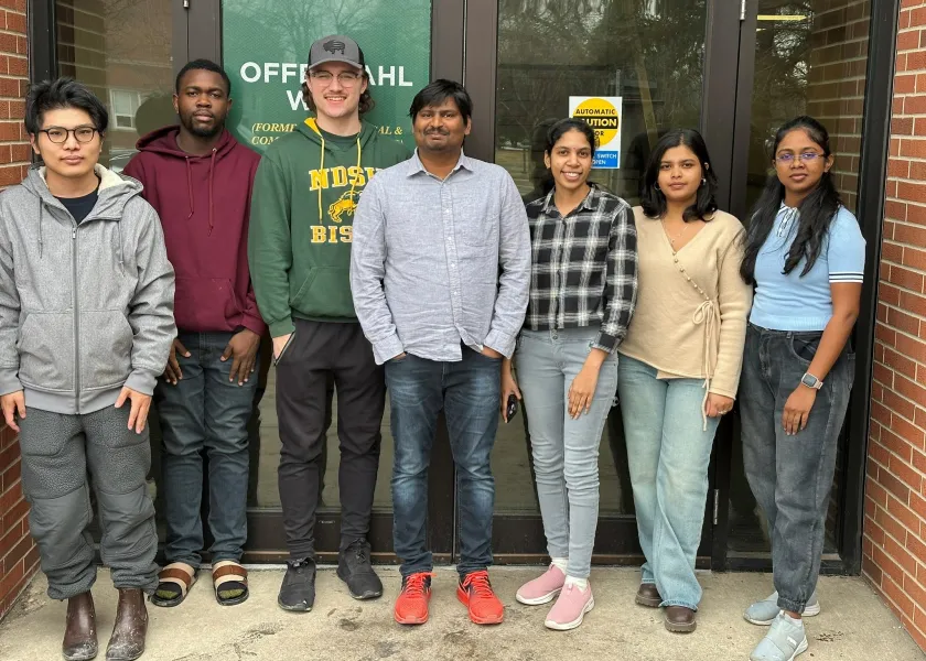 Umamaheswara Rao Tida, an assistant professor of electrical and computer engineering, with his students
