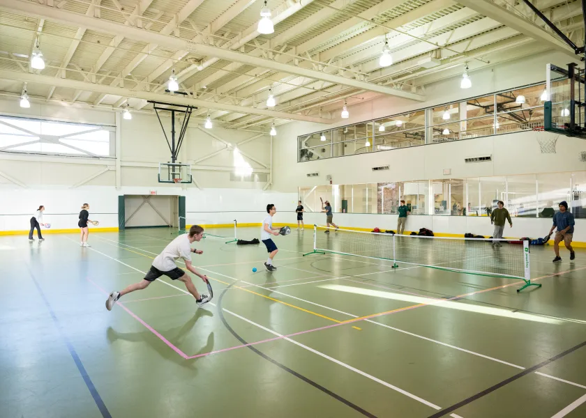 线上赌博app students playing pickleball in the multipurpose gym at the Wellness Center