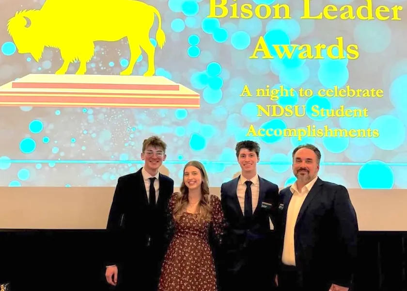 线上赌博app students who earned Bison Awards standing together.