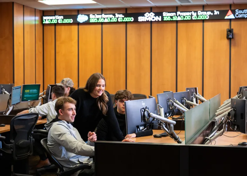 students in the commodities trading room at Barry Hall