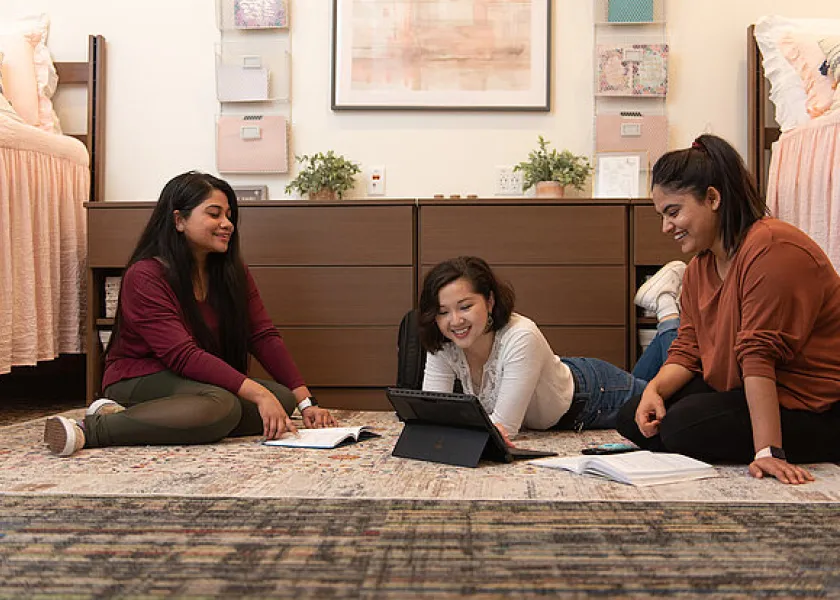 students relaxing in their dorm rooms