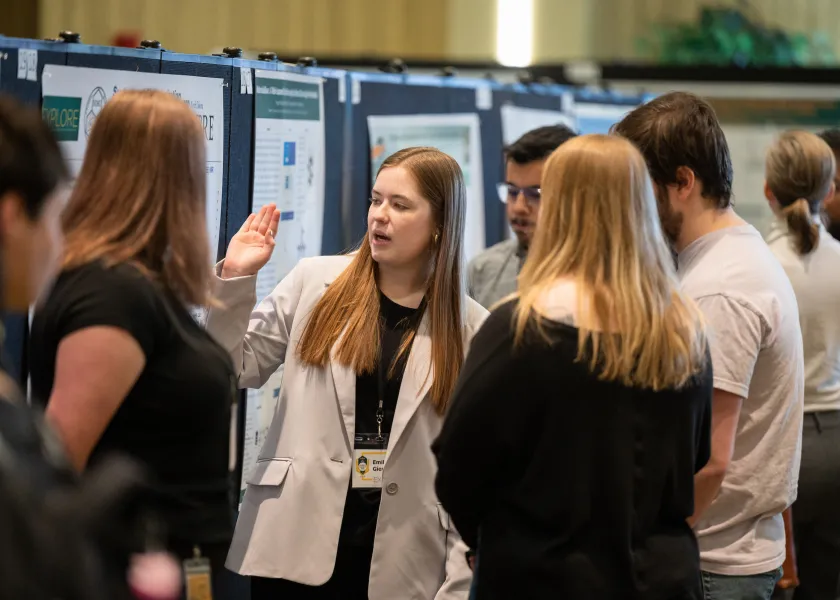 students showing their project as part of Student Research Day