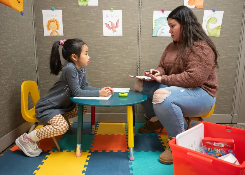 student conducting research with a child as part of a Human Development & Family Science class