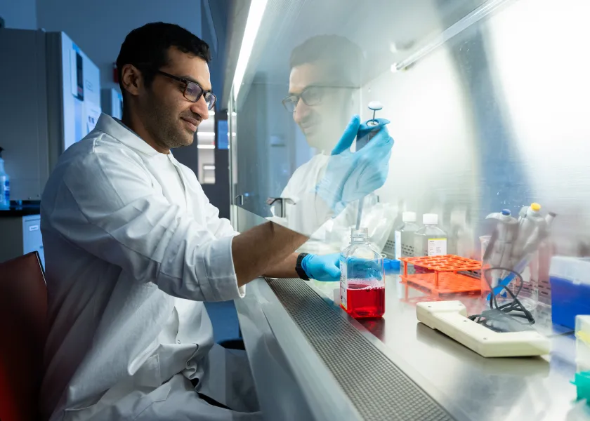 student conducting research in a chemisty lab