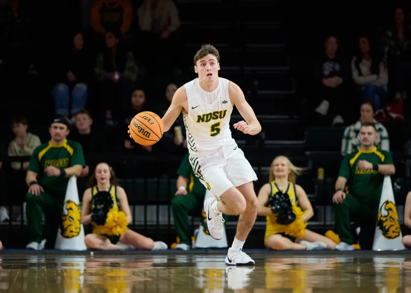 men's basketball action on the court