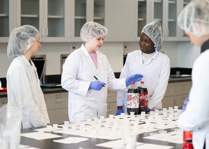 student do research in a food science lab