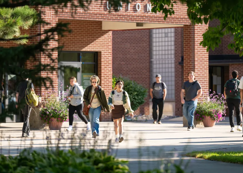 students walking outside in front of the Memorial Union