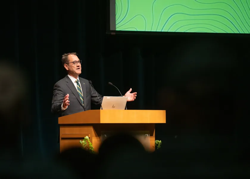 President Cook speaking during State of the University