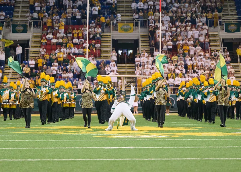 Gold Star Marching Band performs during a Bison football game