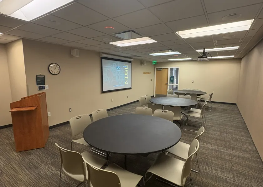 Lark room with round table arrangement
