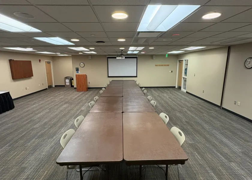 Meadow Lark meeting room in closed rectangle table arrangement