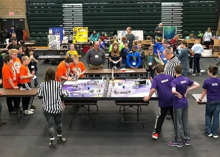 Children competing in the FIRST LEGO League.