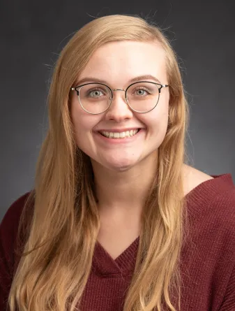 Sydney staring confidently at the camera