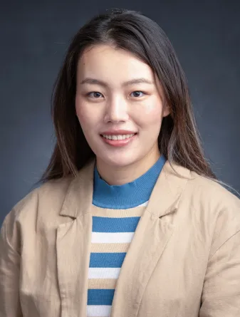 Emily smiling at the camera.