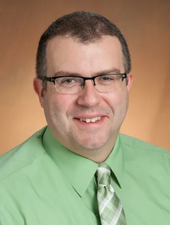 Dave smiling at the camera