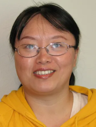 Chunju Gu smiling confidently into the camera.