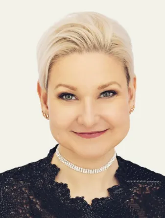 Lyndsi Vander Wal smiling confidently into the camera.