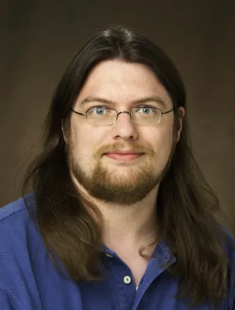 John Buncher looking confidently at camera.