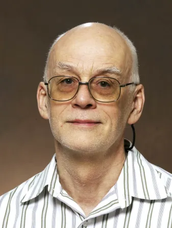 Charles Sawicki looking confidently at camera.