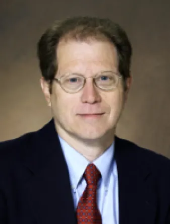 Dr. Verlin Hinsz confidently staring at the camera