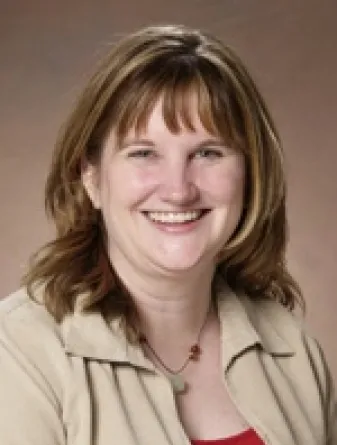 Dr. Linda Langley confidently staring at the camera