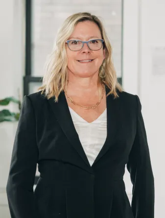 Kimberly smiling confidently at camera