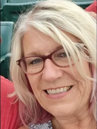 Lea smiling at the camera