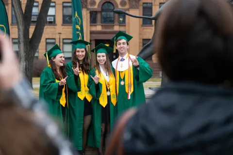 Student in front of academic building