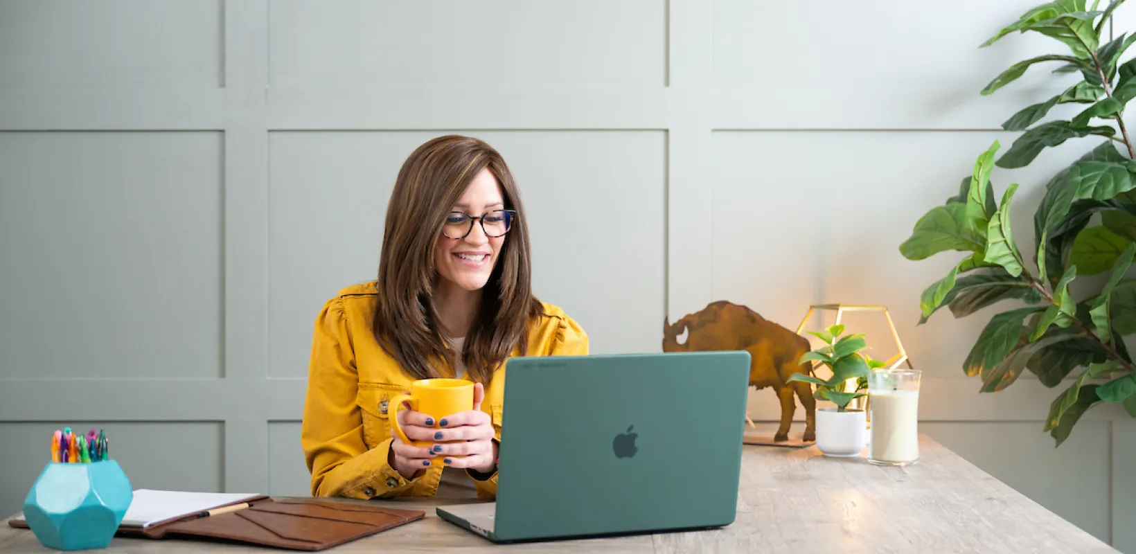 working on laptop in home office