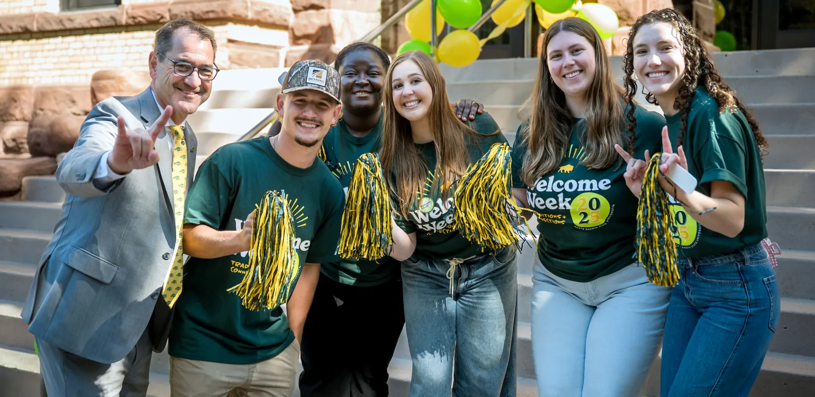 President Cook posing with student during Welcome Week 2025