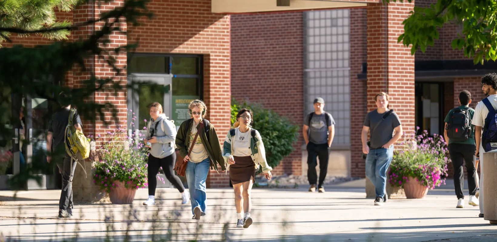 students walking outside in front of the Memorial Union