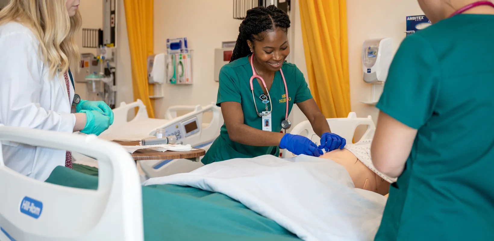 Image of students with patient