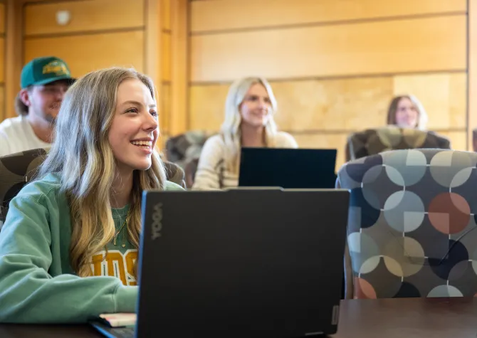 student sitting in classroom