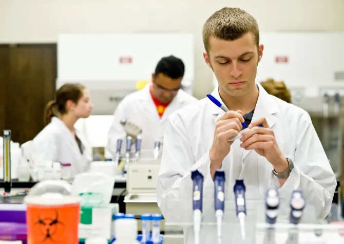 Vet micro student in lab