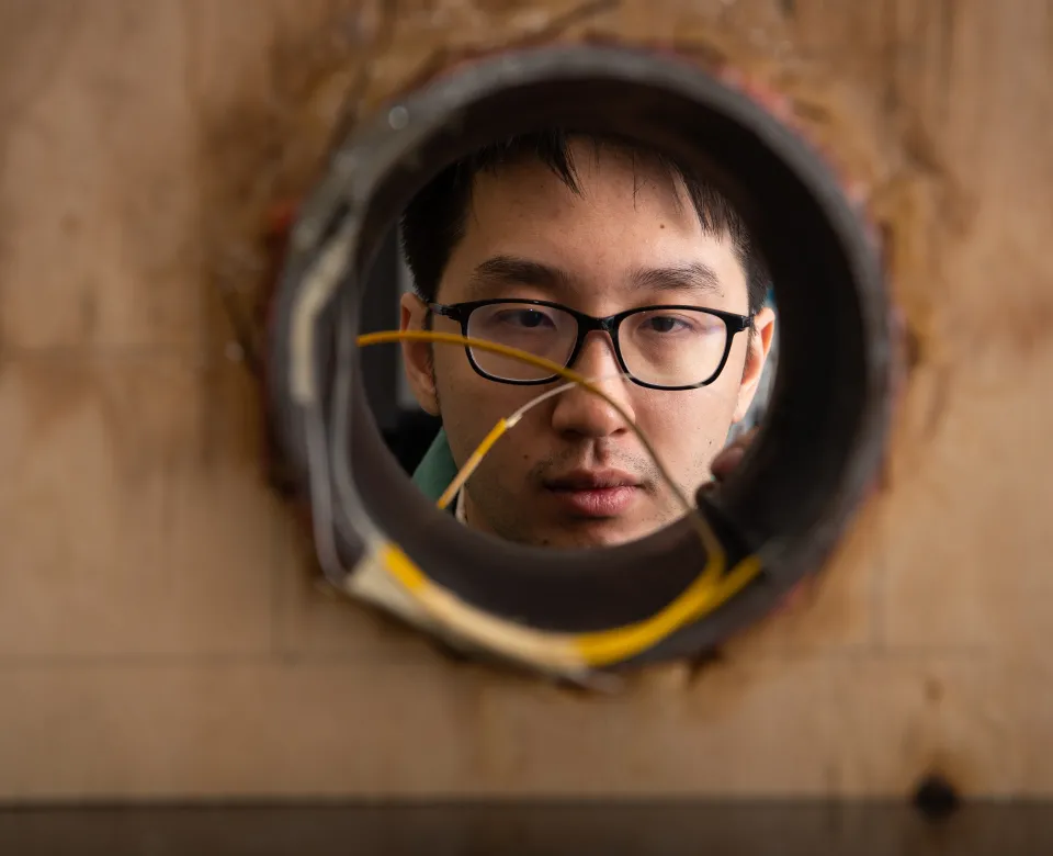 student works on pipeline research