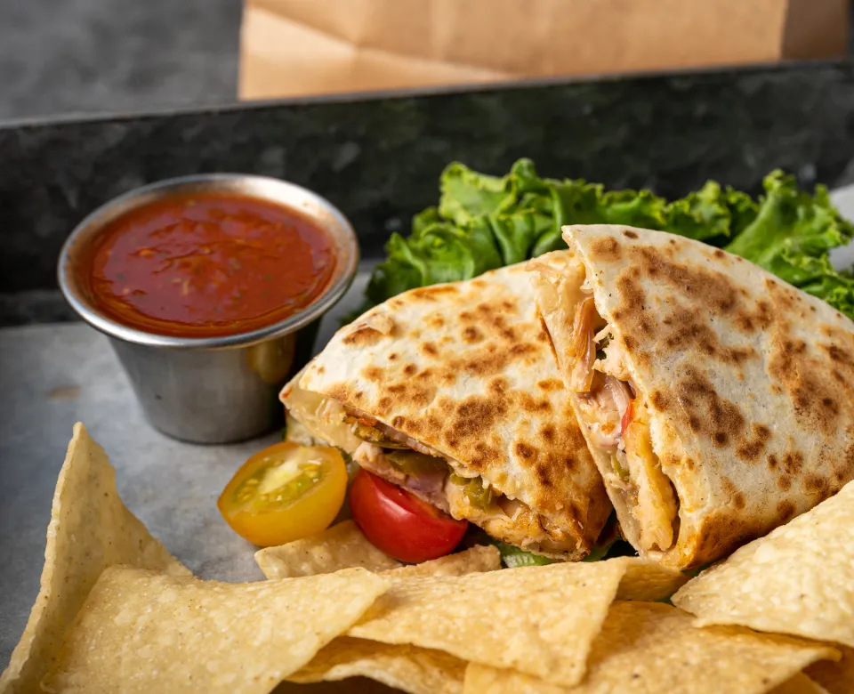 A Quesadilla from Twisted Taco with chips and salsa